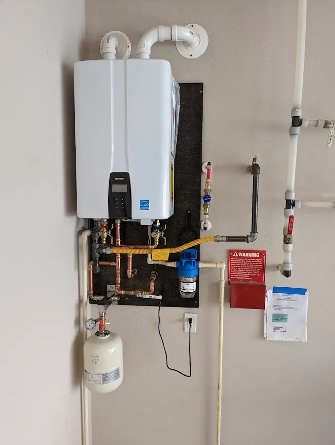 Professional plumber installing copper piping in a Sunnyvale home